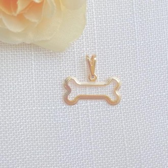 Detalhes do produto Pingente Pet Osso Vazado Borda Reticulada Folheado a Ouro