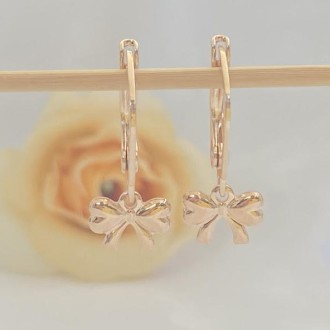 Detalhes do produto Brinco Argola Infantil Laço Folheado a Ouro 18K