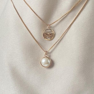 Detalhes do produto Gargantilha dupla Espirito Santo e pérola banhada a ouro 18K