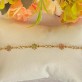 Pulseira Florzinhas com Pedras Coloridas Folheada a Ouro