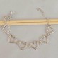 Pulseira Coração Vazado Folheada a Rhodium Branco