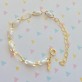Pulseira Infantil Pérola Oval, Folheada a Ouro 18K